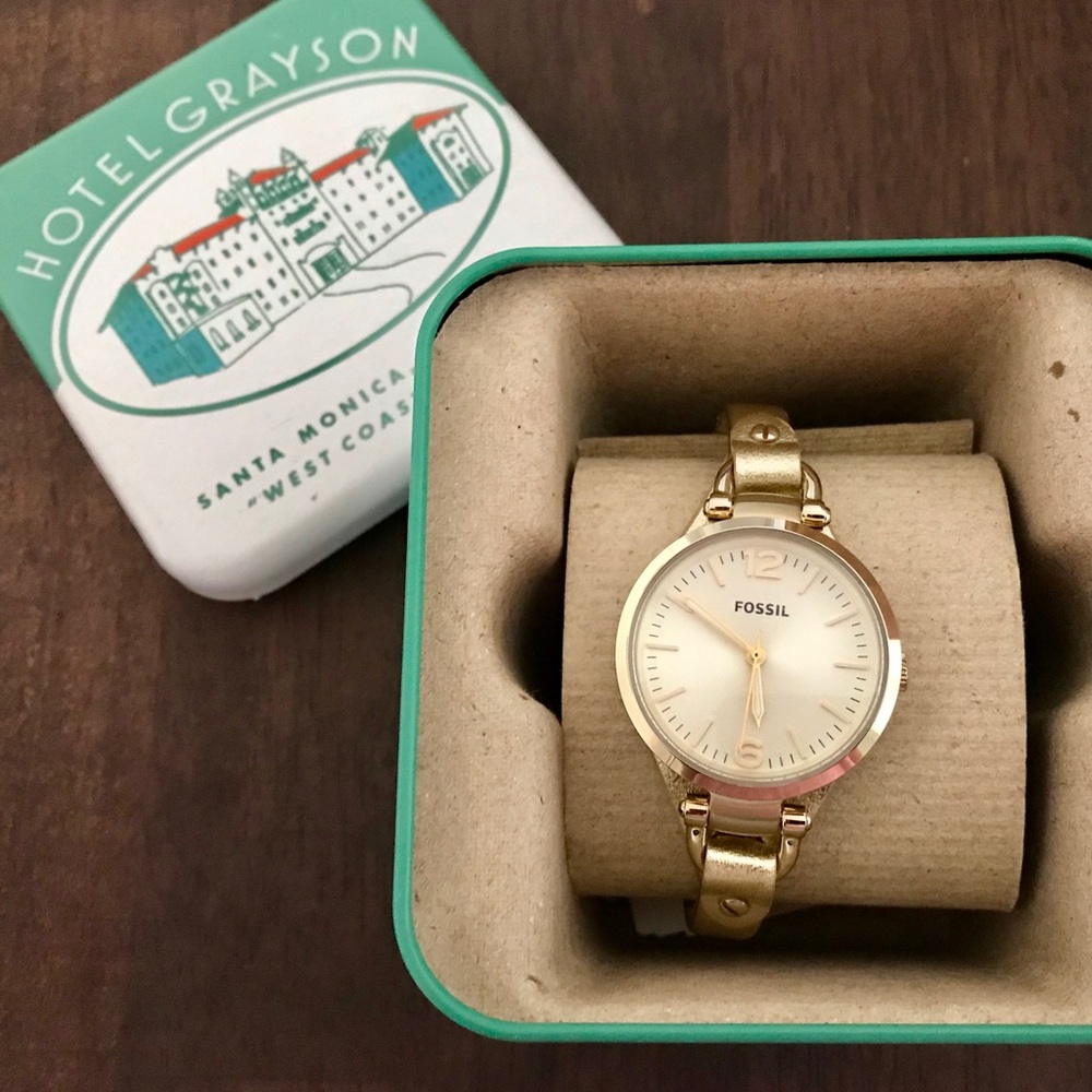 Women’s gold Fossil watch